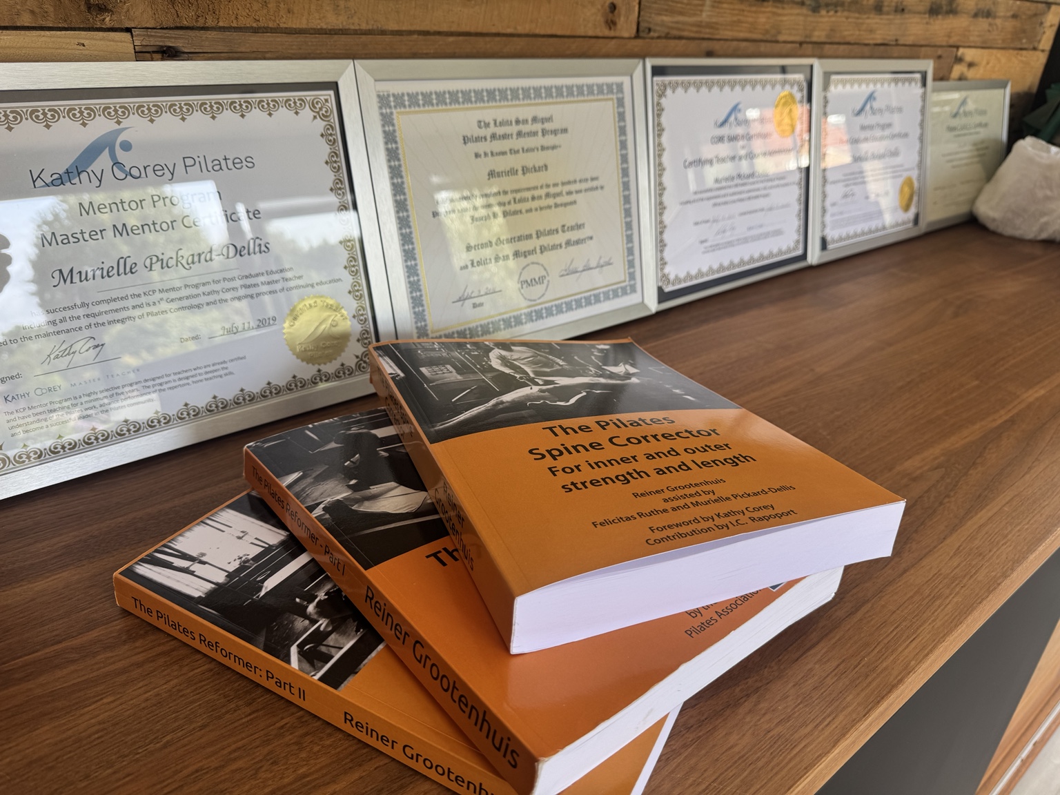 Murielle Pickard-Dellis's Pilates books and teaching certificates