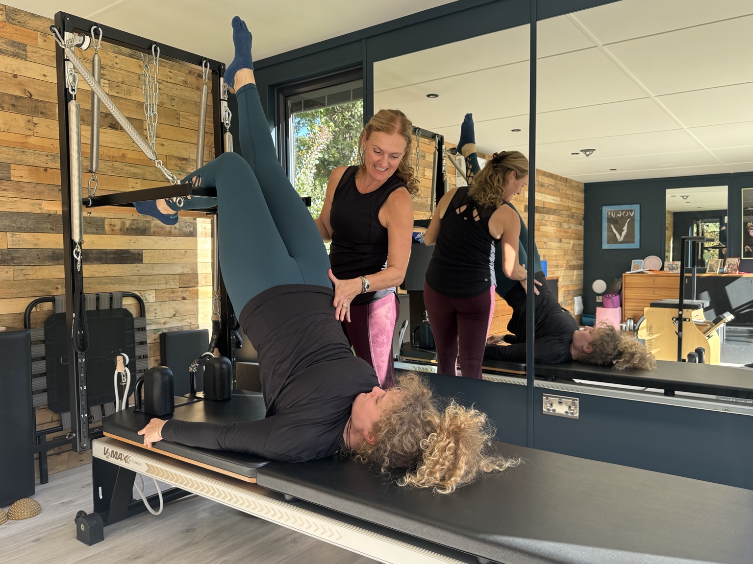 Murielle Pickard-Dellis teaching a private Pilates session on the Reformer
